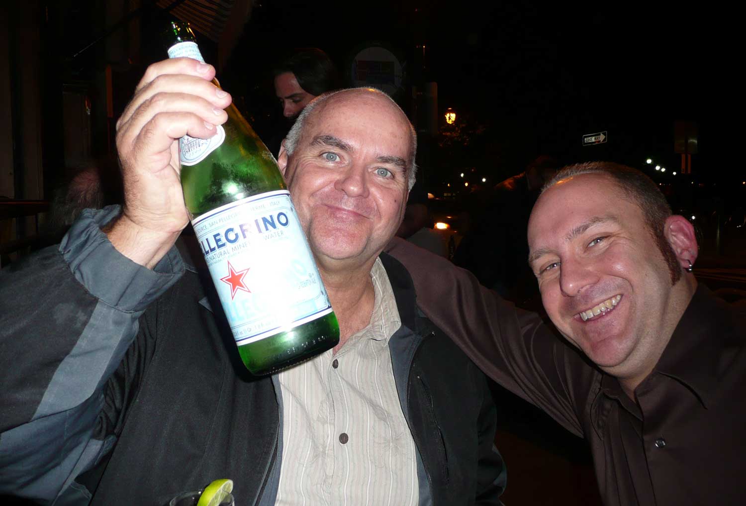 Cheers! Land F/X co-founders Dave and Jeremiah Farmer celebrate another successful trade show.