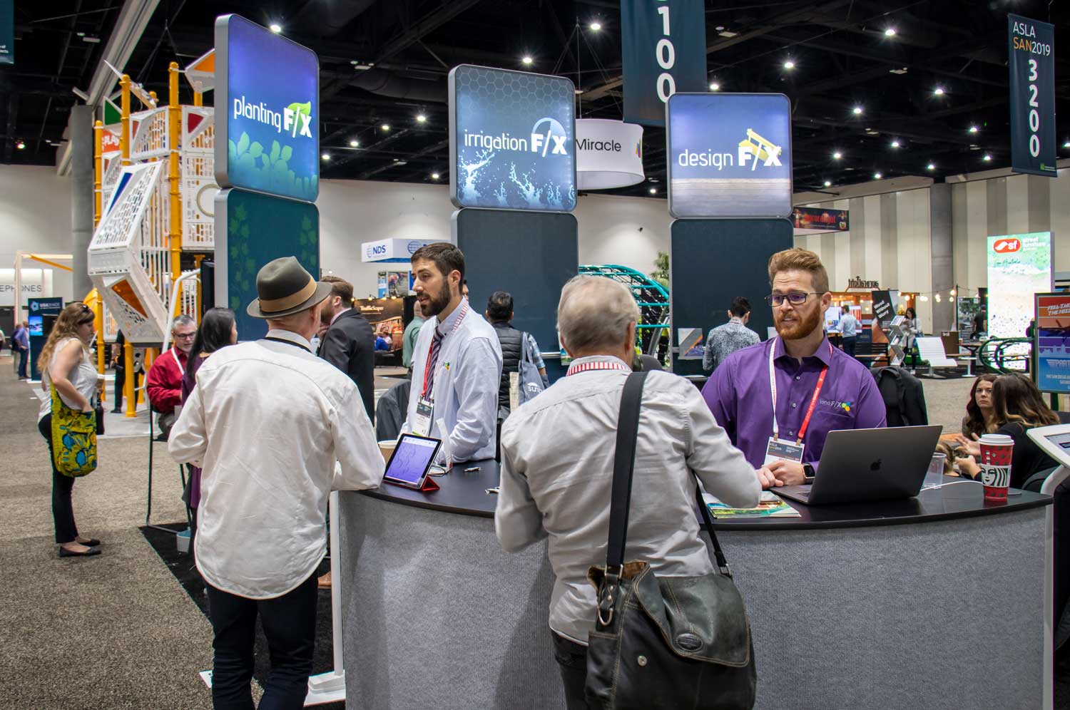 The day’s first visitors are ready to talk shop – and be wowed by the software, of course. ASLA 2019, San Diego.